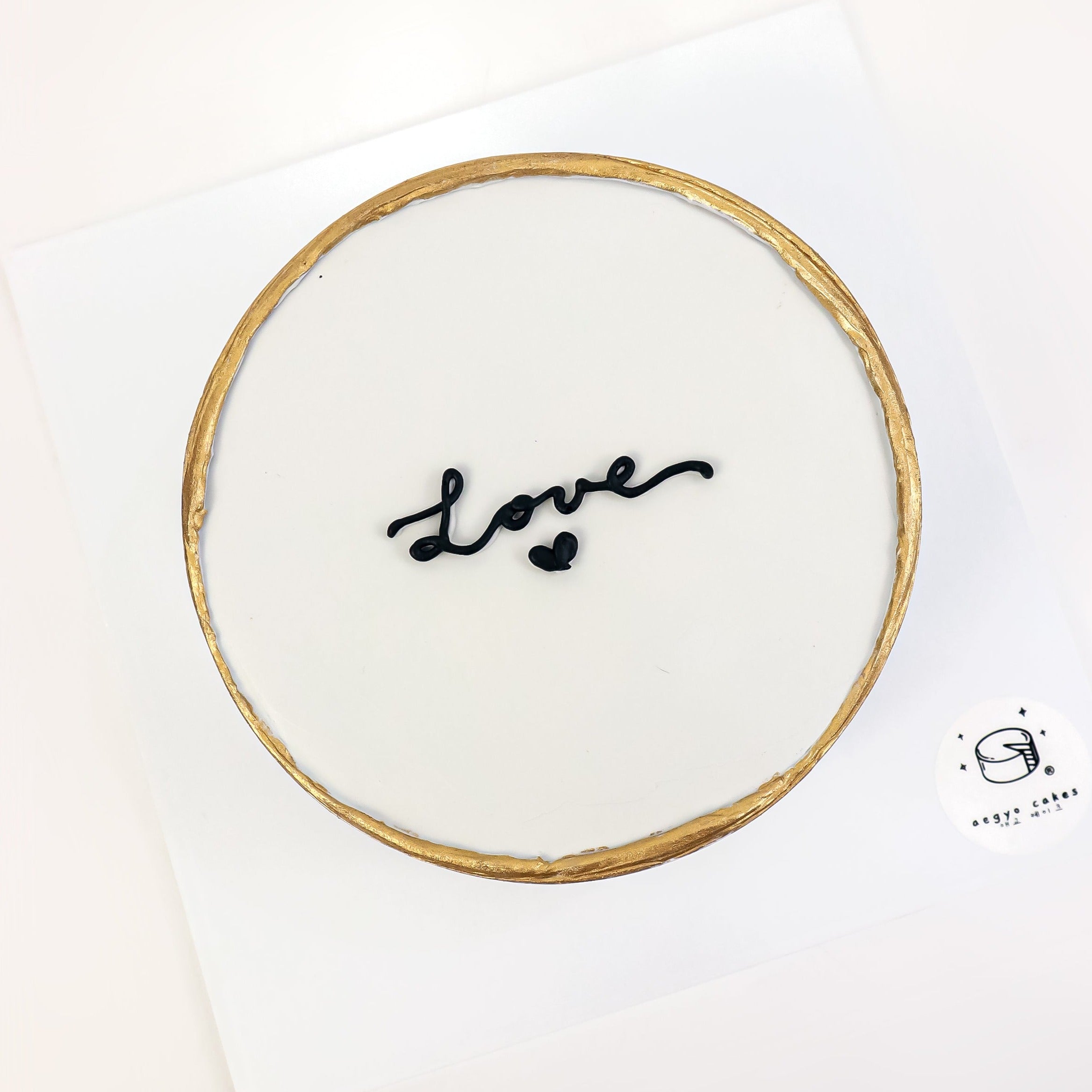 Gold-Rimmed Signature Aegyo Cake Slot Reservation